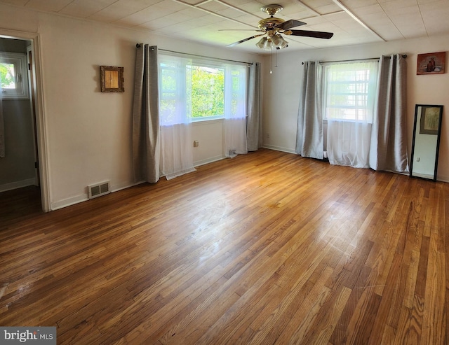 2102 Princeton Pike, Lawrence Township, NJ 08648 - empty room featuring wood finished floors, a ceiling fan, and baseboards