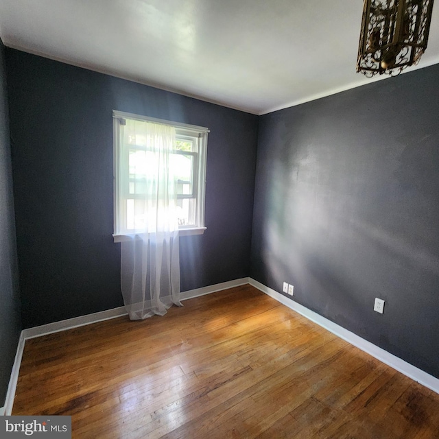 2102 Princeton Pike, Lawrence Township, NJ 08648 - spare room with wood-type flooring and baseboards