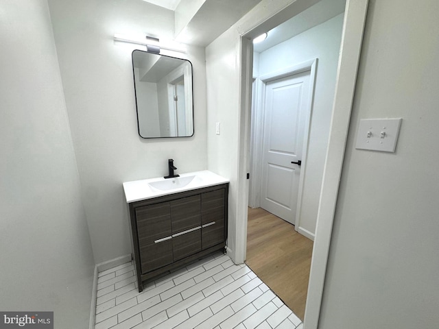 23 Karen Ct, New Castle, DE 19720 - bathroom with vanity, tile patterned flooring, and baseboards