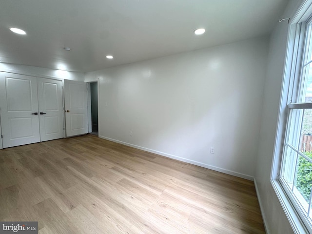 23 Karen Ct, New Castle, DE 19720 - unfurnished bedroom featuring light wood-style flooring, baseboards, and recessed lighting