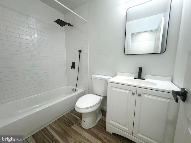 23 Karen Ct, New Castle, DE 19720 - bathroom featuring toilet, vanity, bathtub / shower combination, and wood finished floors