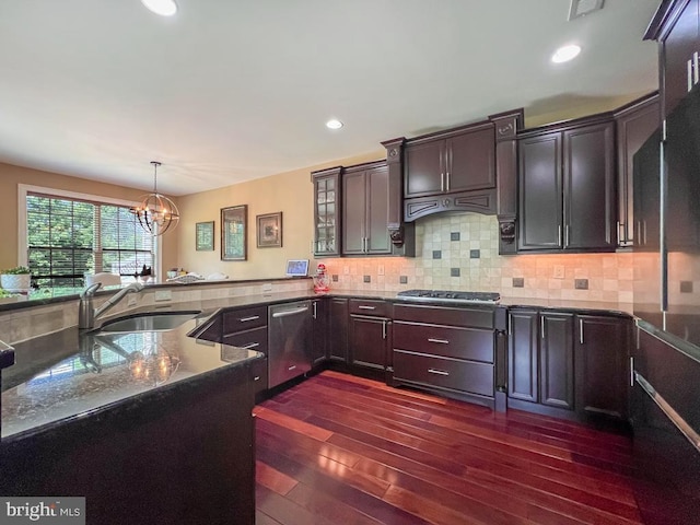 414 Saint James Ct, Langhorne, PA 19047 - kitchen with a sink, stainless steel appliances, dark wood-style floors, a chandelier, and dark stone countertops