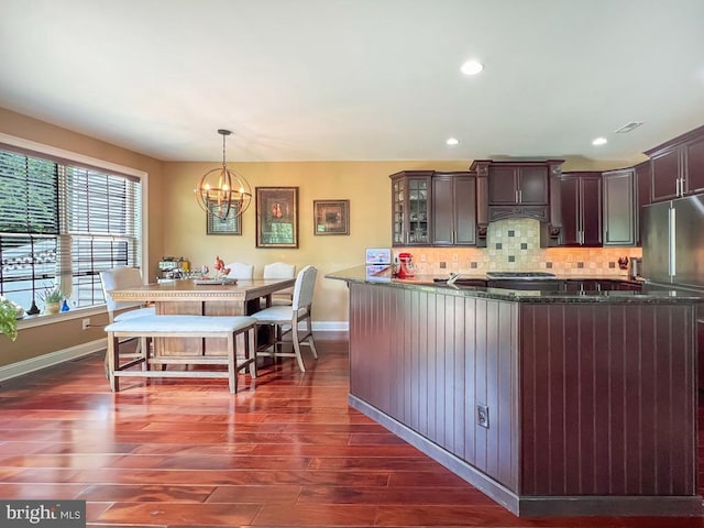 414 Saint James Ct, Langhorne, PA 19047 - kitchen featuring freestanding refrigerator, a chandelier, dark wood finished floors, baseboards, and tasteful backsplash
