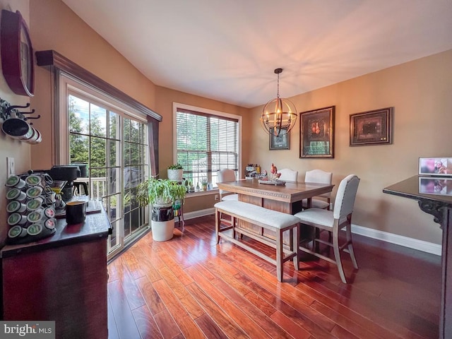 414 Saint James Ct, Langhorne, PA 19047 - dining room with a chandelier, wood finished floors, and baseboards