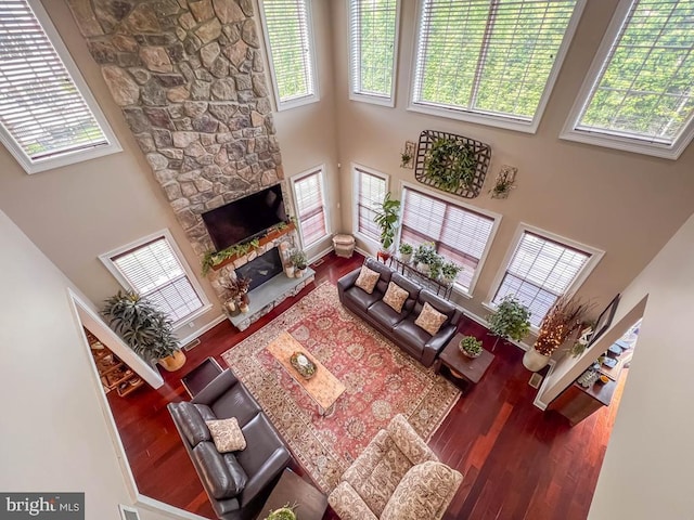 414 Saint James Ct, Langhorne, PA 19047 - living room featuring a towering ceiling, healthy amount of natural light, and wood finished floors