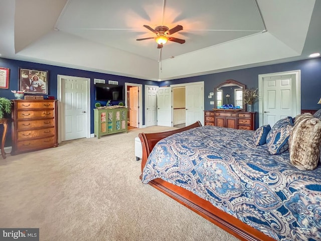 414 Saint James Ct, Langhorne, PA 19047 - carpeted bedroom with a tray ceiling and ceiling fan