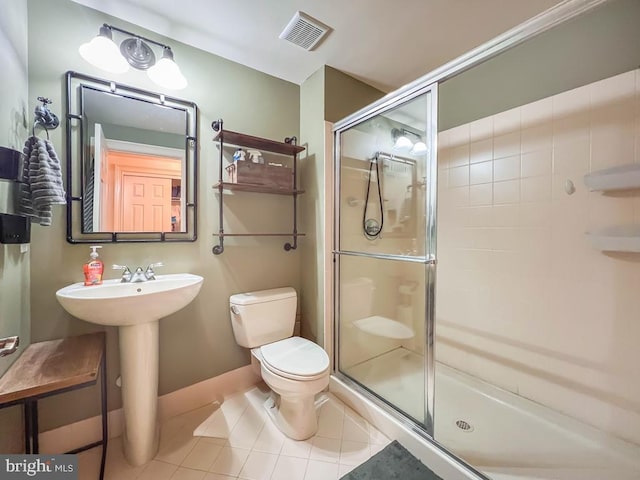 414 Saint James Ct, Langhorne, PA 19047 - bathroom with toilet, tile patterned floors, a stall shower, and a sink