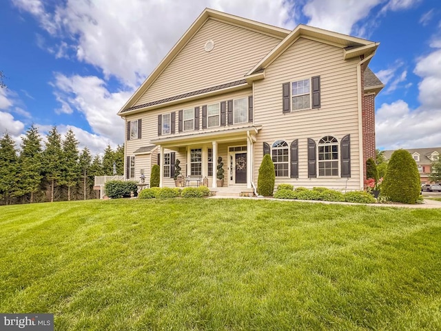 414 Saint James Ct, Langhorne, PA 19047 - view of front of property with covered porch and a front lawn