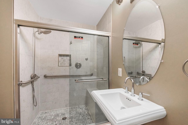 42435 Ibex Dr, Sterling, VA 20166 - bathroom featuring a shower stall and a sink