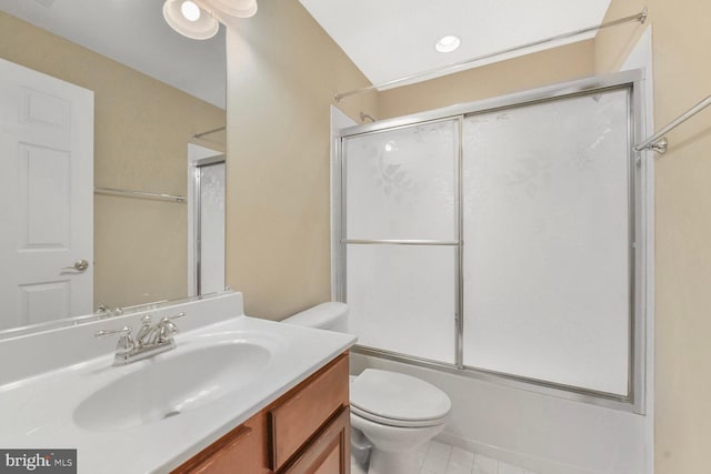 42435 Ibex Dr, Sterling, VA 20166 - full bathroom with vanity, toilet, tile patterned floors, and combined bath / shower with glass door