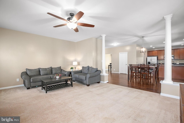 5194 Longbow Rd, King George, VA 22485 - carpeted living area with decorative columns, baseboards, a ceiling fan, and recessed lighting
