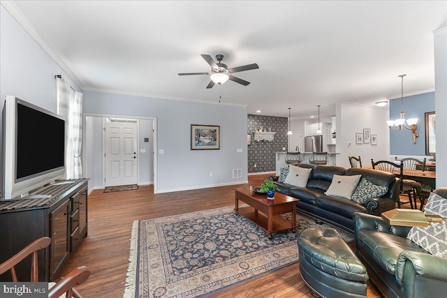 217 Honeycroft Blvd, Cochranville, PA 19330 - living room featuring ceiling fan, dark wood finished floors, crown molding, baseboards, and a chandelier