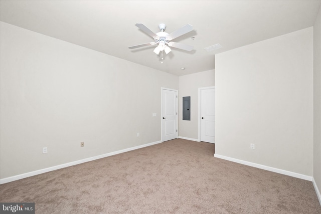 113 E Main St Unit 303, Newark, DE 19711 - empty room featuring electric panel, carpet, and a ceiling fan