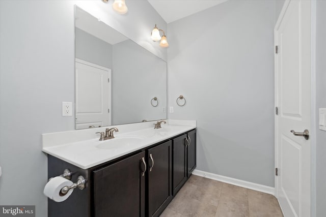113 E Main St Unit 303, Newark, DE 19711 - full bathroom featuring double vanity and baseboards