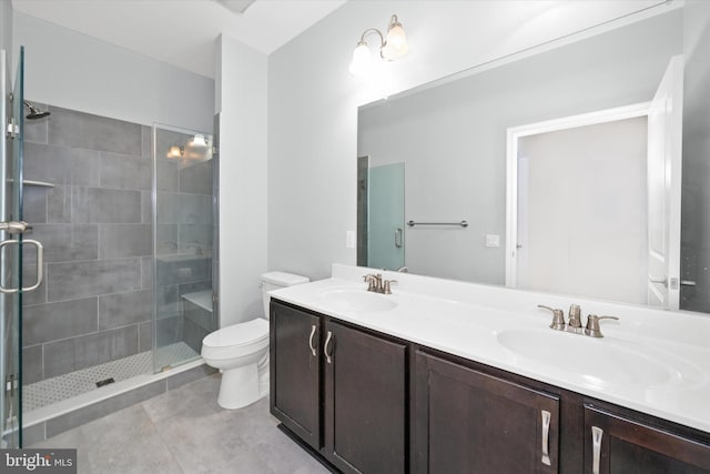 113 E Main St Unit 303, Newark, DE 19711 - bathroom featuring a stall shower, double vanity, and tile patterned flooring
