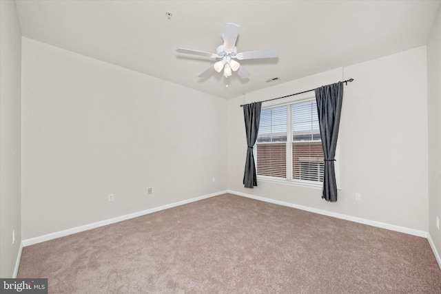113 E Main St Unit 303, Newark, DE 19711 - carpeted spare room with baseboards and ceiling fan