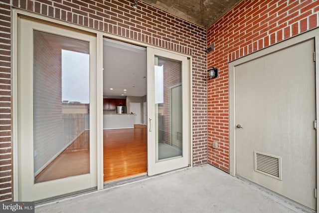 113 E Main St Unit 303, Newark, DE 19711 - doorway to property with brick siding