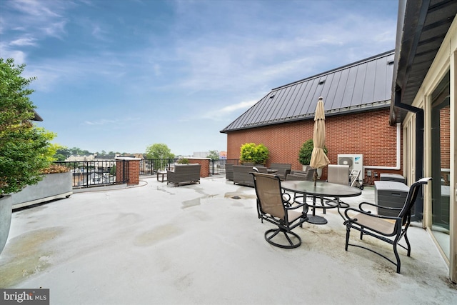 113 E Main St Unit 303, Newark, DE 19711 - view of patio featuring an outdoor living space