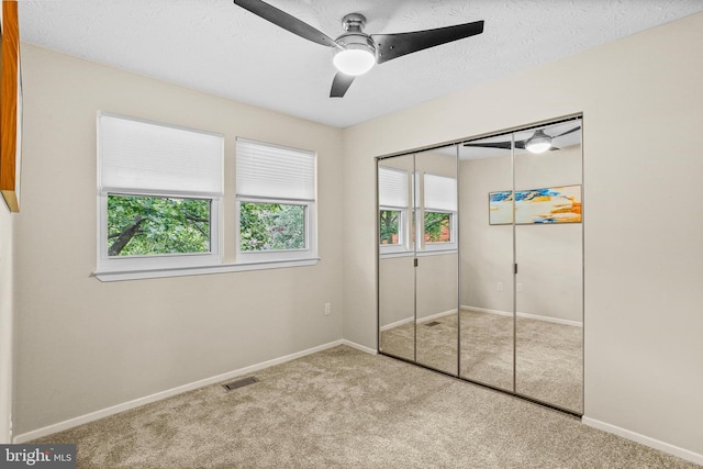 7533 Weather Worn Way Unit D, Columbia, MD 21046 - unfurnished bedroom featuring carpet floors, a closet, and a ceiling fan