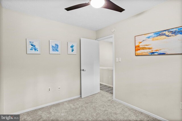 7533 Weather Worn Way Unit D, Columbia, MD 21046 - unfurnished bedroom with carpet and ceiling fan