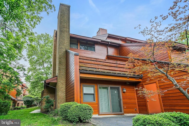 7533 Weather Worn Way Unit D, Columbia, MD 21046 - back of property featuring a chimney