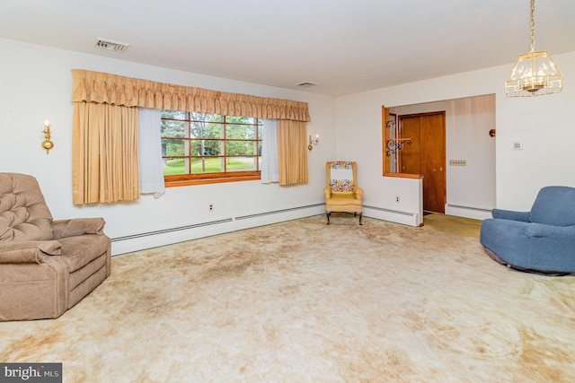 243 Park Ave, Mount Joy, PA 17552 - sitting room with a baseboard radiator, carpet floors, a baseboard heating unit, and a chandelier