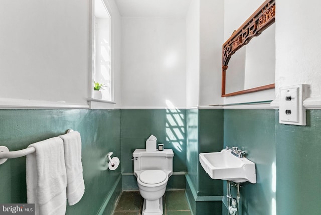 8515 Seminole St, Philadelphia, PA 19118 - bathroom with a sink, toilet, baseboards, and tile patterned flooring