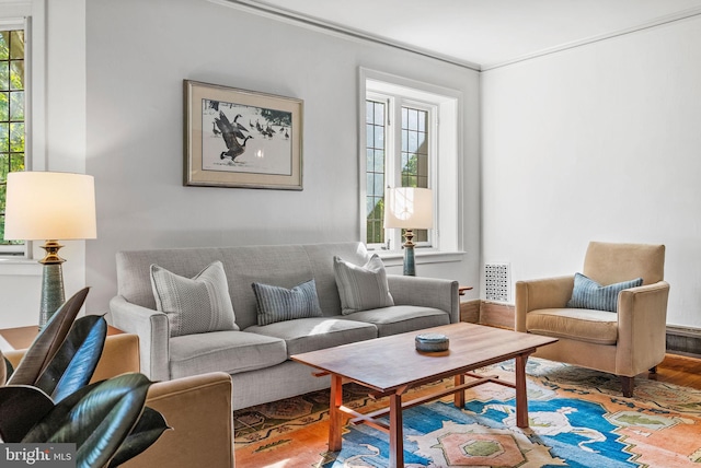 8515 Seminole St, Philadelphia, PA 19118 - living area featuring wood finished floors, healthy amount of natural light, and ornamental molding