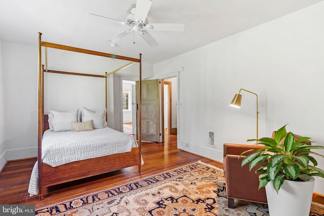 8515 Seminole St, Philadelphia, PA 19118 - bedroom with wood finished floors, baseboards, and ceiling fan
