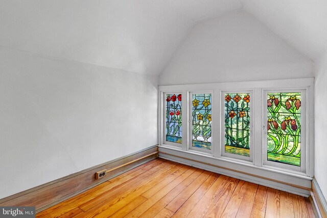 8515 Seminole St, Philadelphia, PA 19118 - bonus room with vaulted ceiling, wood-type flooring, and baseboards