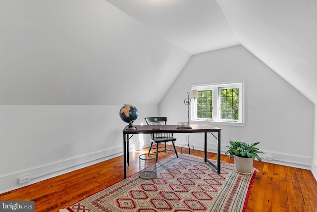 8515 Seminole St, Philadelphia, PA 19118 - home office with vaulted ceiling, hardwood / wood-style floors, and baseboards
