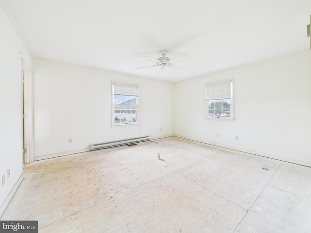 423 W Market St, Georgetown, DE 19947 - empty room with a baseboard radiator and ceiling fan