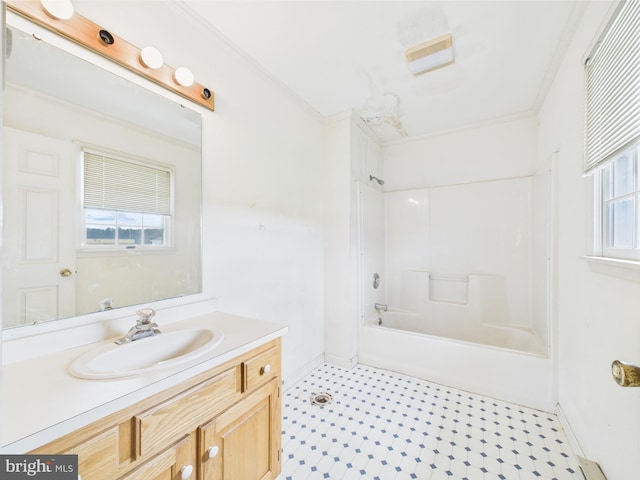 423 W Market St, Georgetown, DE 19947 - full bathroom featuring vanity, baseboards, shower / bath combination, and crown molding