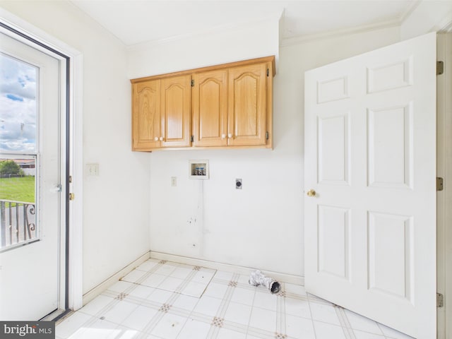 423 W Market St, Georgetown, DE 19947 - washroom with hookup for a washing machine, hookup for an electric dryer, light flooring, cabinet space, and ornamental molding