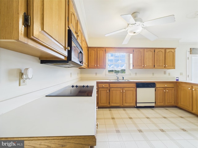 423 W Market St, Georgetown, DE 19947 - kitchen featuring black appliances, crown molding, light countertops, brown cabinetry, and ceiling fan