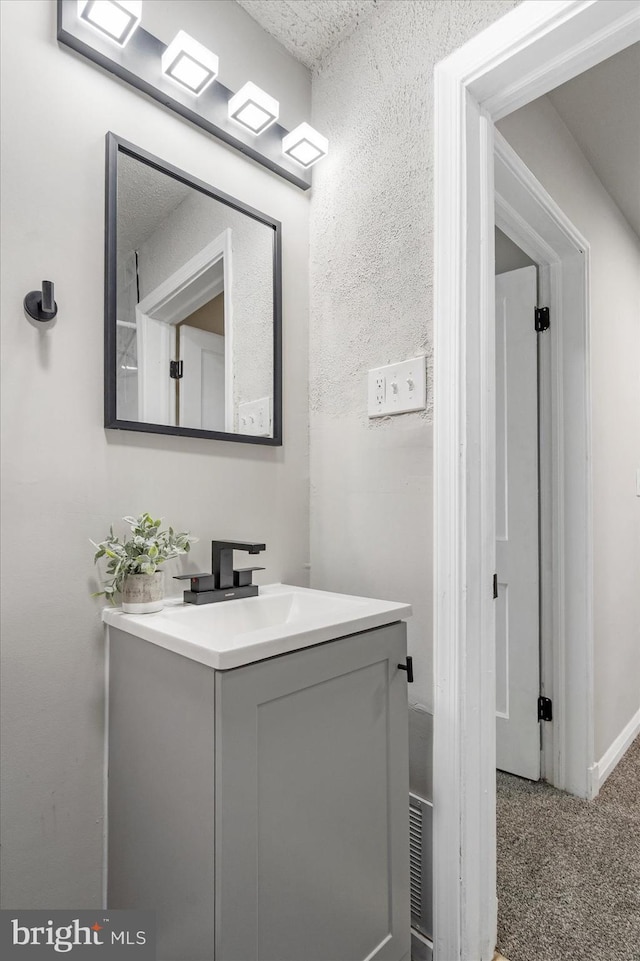 7509 Durwood Rd, Baltimore, MD 21222 - bathroom with vanity and baseboards