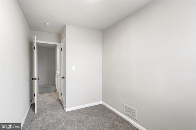 7509 Durwood Rd, Baltimore, MD 21222 - carpeted empty room featuring baseboards