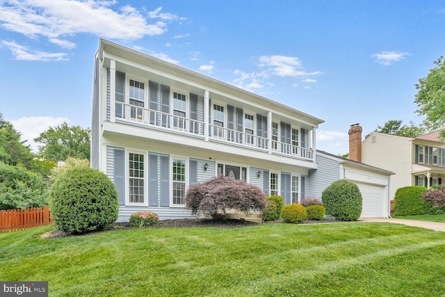 6034 Burnside Landing Dr, Burke, VA 22015 - view of front facade with a garage and concrete driveway