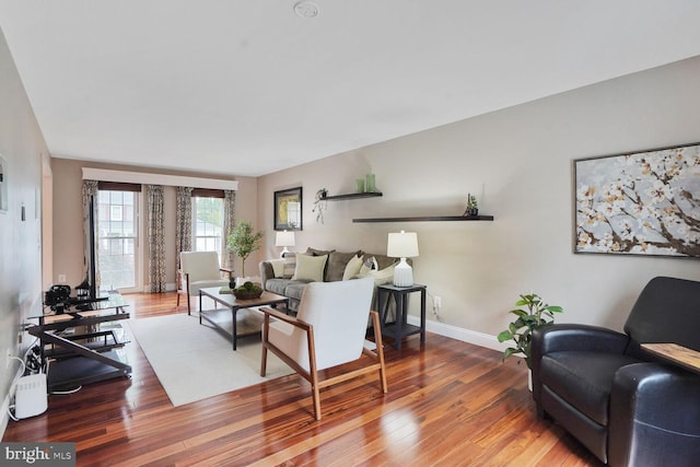 6034 Burnside Landing Dr, Burke, VA 22015 - living room featuring wood finished floors and baseboards