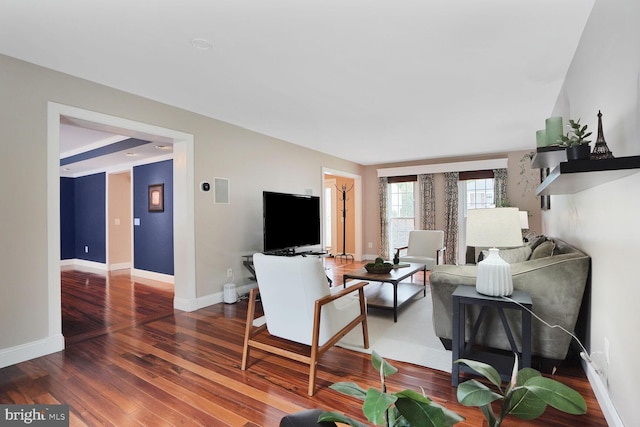 6034 Burnside Landing Dr, Burke, VA 22015 - living area with hardwood / wood-style flooring and baseboards