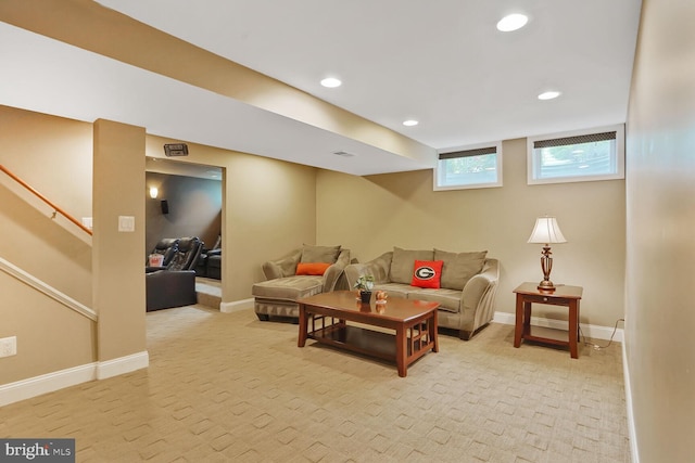 6034 Burnside Landing Dr, Burke, VA 22015 - living room with light carpet, recessed lighting, baseboards, and stairway