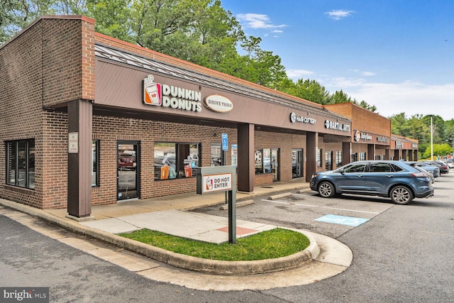 6034 Burnside Landing Dr, Burke, VA 22015 - view of building exterior with uncovered parking