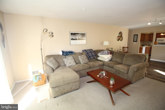 29 Huber Ct, Hightstown, NJ 08520 - living area featuring baseboards and wood finished floors