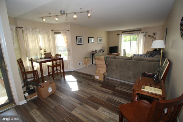 29 Huber Ct, Hightstown, NJ 08520 - living room featuring dark wood-style floors and baseboards