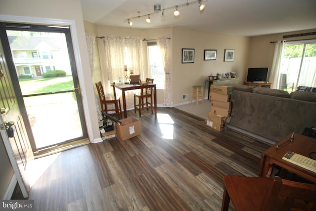 29 Huber Ct, Hightstown, NJ 08520 - living area featuring dark wood-style floors, baseboards, and track lighting