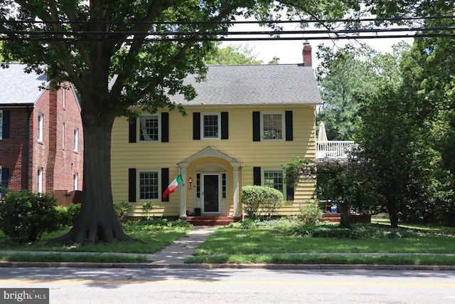 305 Washington Ave, Chestertown, MD 21620 - colonial home featuring a chimney and a front lawn