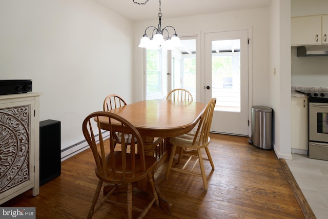 1581 W Branch Rd, State College, PA 16801 - dining room featuring light wood-type flooring, baseboard heating, and a chandelier