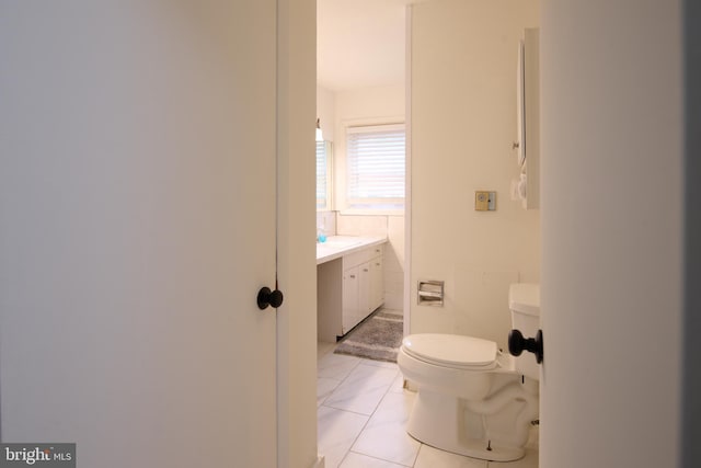 1581 W Branch Rd, State College, PA 16801 - half bath with toilet, vanity, and marble finish flooring