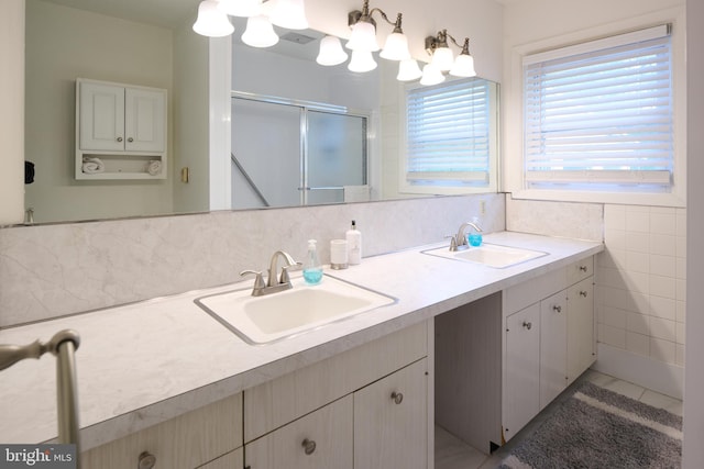 1581 W Branch Rd, State College, PA 16801 - full bath featuring double vanity, a shower stall, tasteful backsplash, and a chandelier