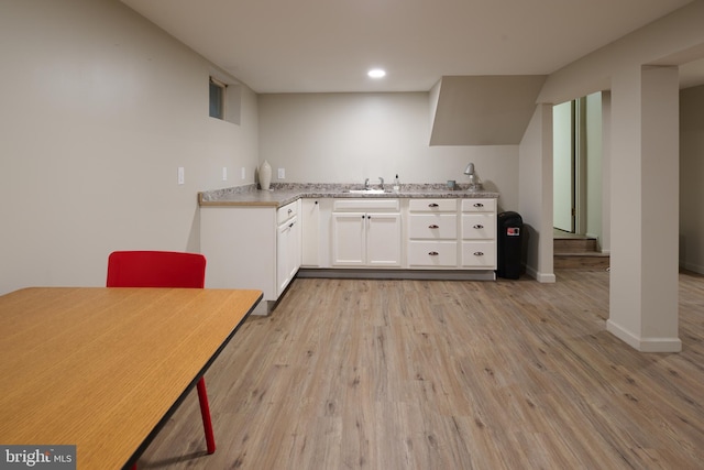 1581 W Branch Rd, State College, PA 16801 - kitchen with white cabinetry, light wood-type flooring, light countertops, recessed lighting, and a sink